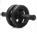 Rouleur abdominal VELNOX Fitness™ Core Pro de la marque ggg, avec poignées ergonomiques et rouleau en mousse.